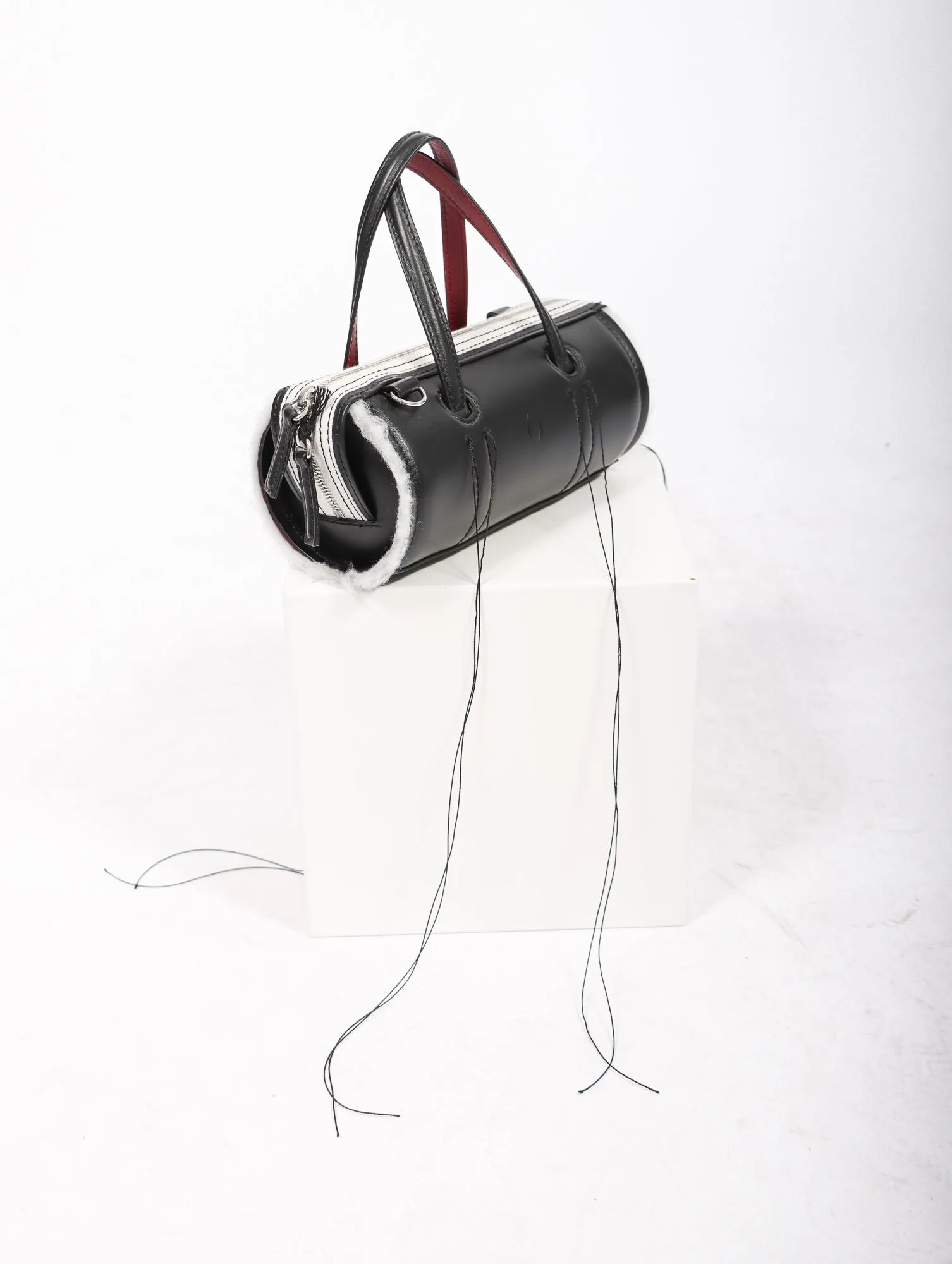 Anona Cylinder Bag in Black by Dentro