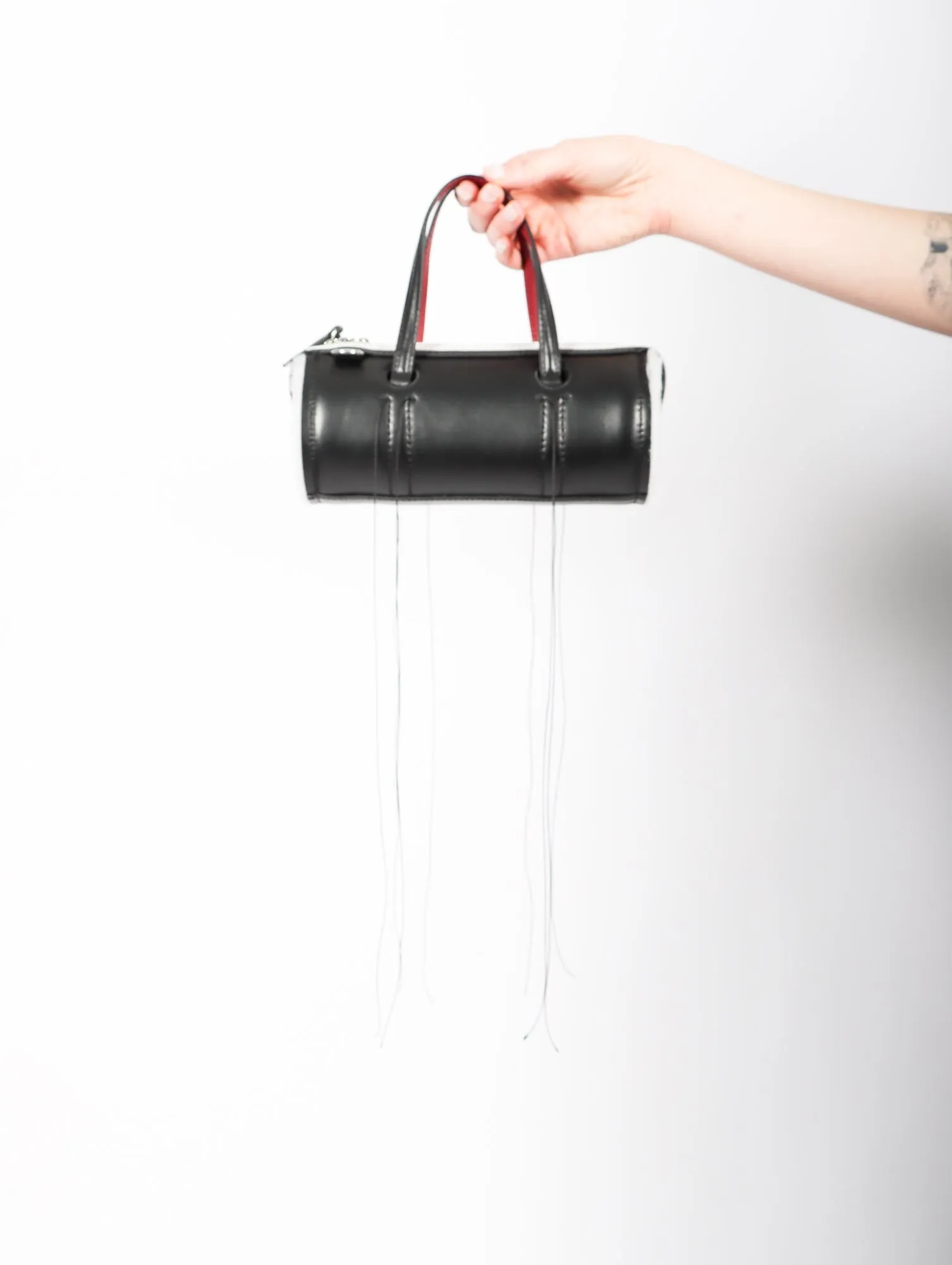 Anona Cylinder Bag in Black by Dentro