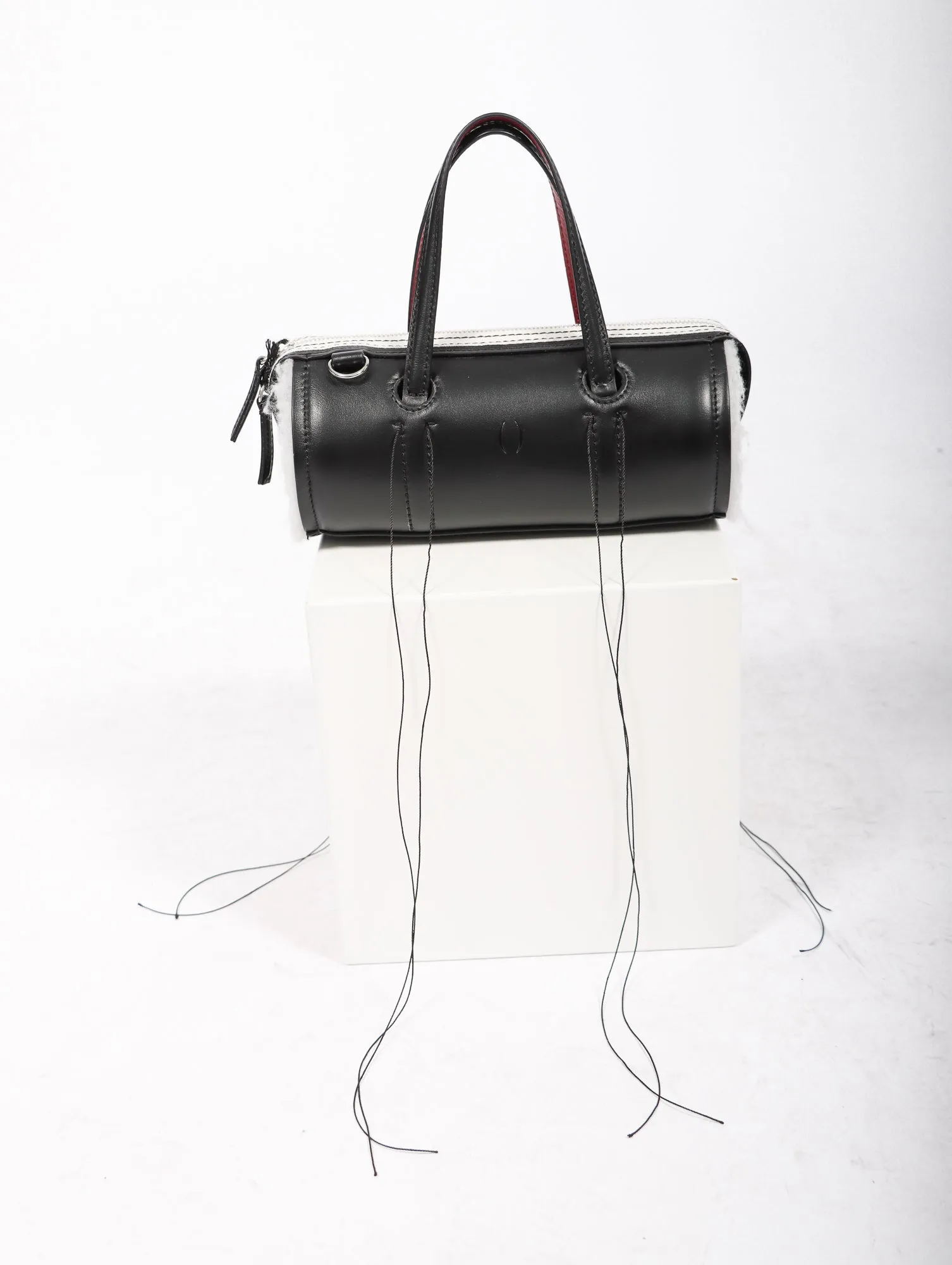 Anona Cylinder Bag in Black by Dentro